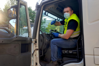 Van driver with face mask